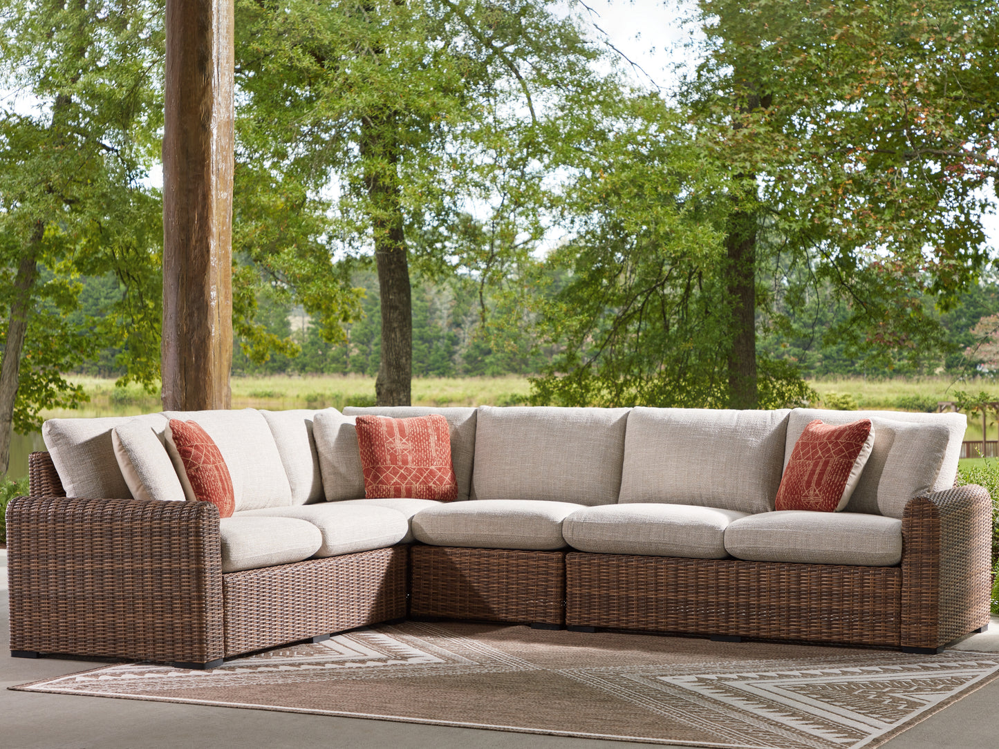 Bradenton Furniture Outlet - Ashley Furniture - Dolan Creek Outdoor - 4-Piece Outdoor Sectional / Beige/Brown - PCP610P2