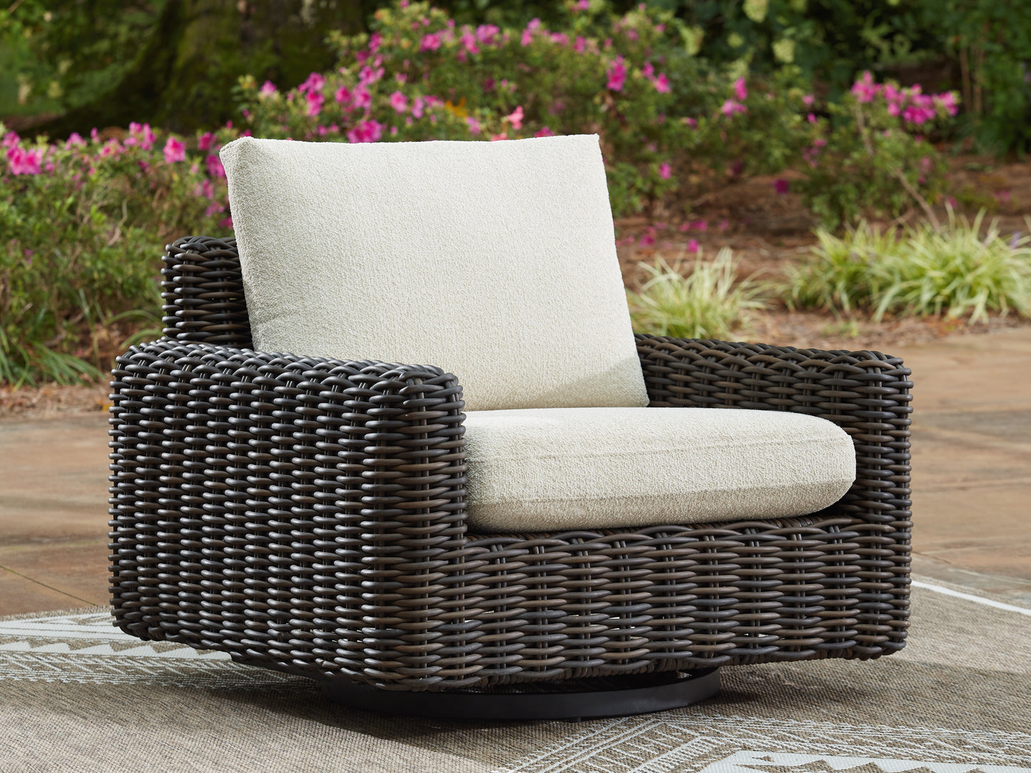Bradenton Furniture Outlet - Ashley Furniture - Kimora Outdoor - Swivel Glider Lounge w/Cushion / Beige/Dark Brown - P711-821