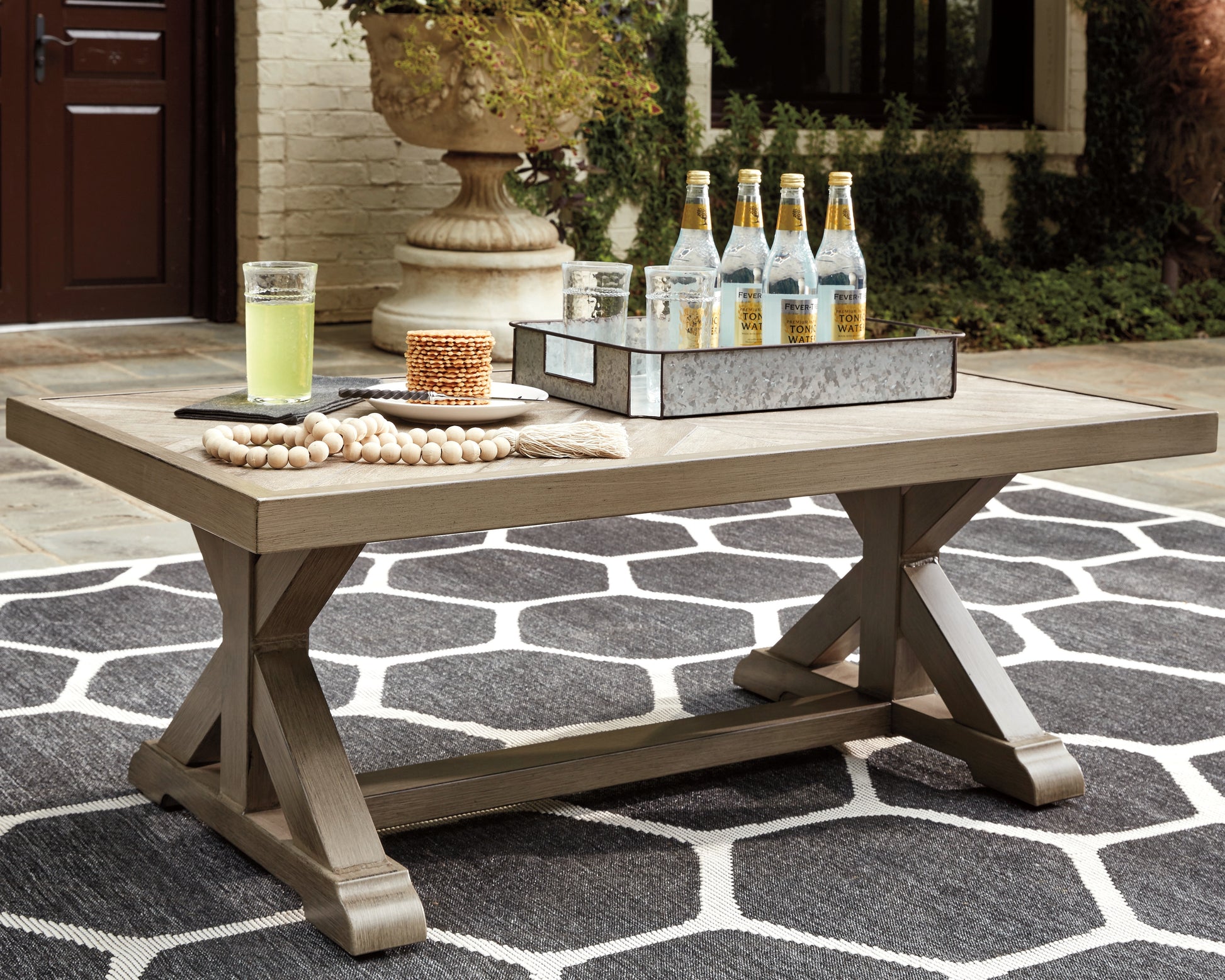Bradenton Furniture Outlet - Ashley Furniture - Beachcroft Outdoor - Rectangular Cocktail Table / Beige - P791-701