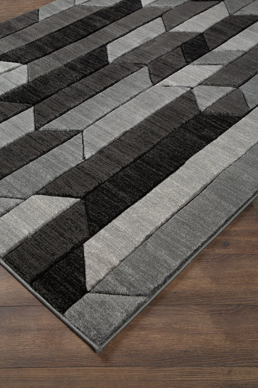 Bradenton Furniture Outlet - Ashley Furniture - Chayse Rug - 6'6" x 9'6" Rug / Black/Gray - R403461