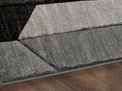 Bradenton Furniture Outlet - Ashley Furniture - Chayse Rug - 5' x 6'7" Rug / Black/Gray - R403462