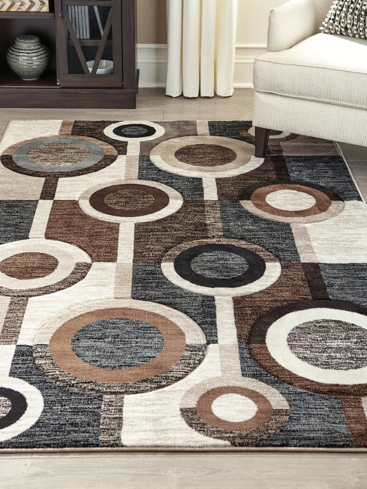 Bradenton Furniture Outlet - Ashley Furniture - Guintte Rug - 5' x 6'7" Rug / Multi - R403972