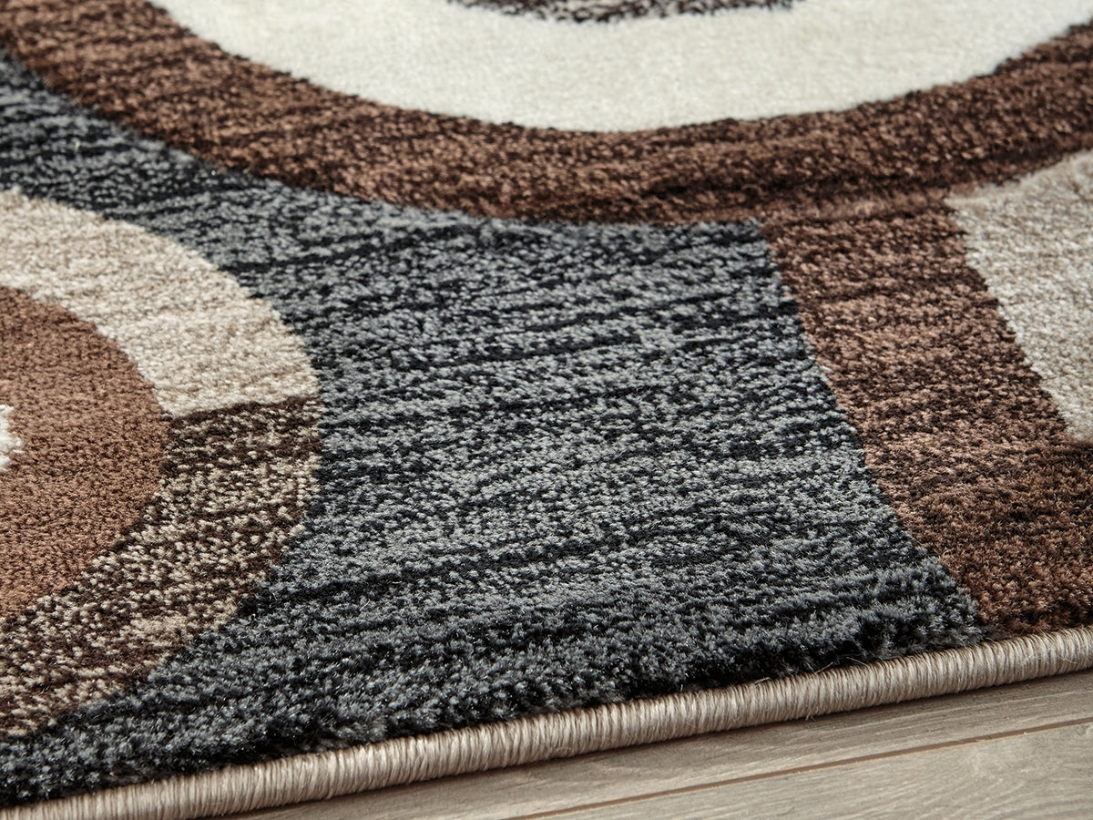 Bradenton Furniture Outlet - Ashley Furniture - Guintte Rug - 5' x 6'7" Rug / Multi - R403972