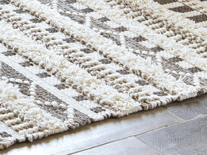 Bradenton Furniture Outlet - Ashley Furniture - Karalee Rug - 5' x 7' Rug / Ivory/Brown - R404442
