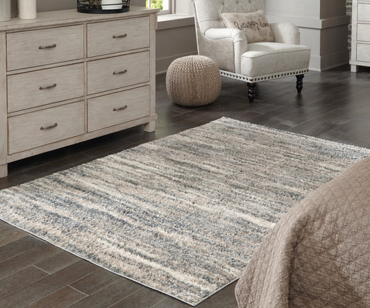 Bradenton Furniture Outlet - Ashley Furniture - Gizela Rug - 7'10" x 10' Rug / Ivory/Beige/Gray - R404861