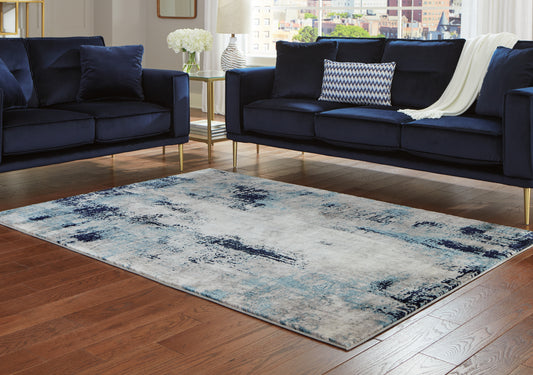 Bradenton Furniture Outlet - Ashley Furniture - Leonelle Rug - 5'3" x 7'3" Rug / Cream/Blue/Gray - R404872