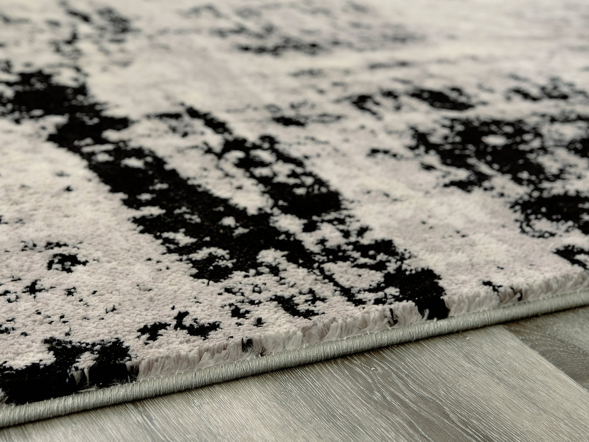 Bradenton Furniture Outlet - Ashley Furniture - Zekeman Rug - 7'10" x 10' Rug / Black/Cream/Gray - R404921