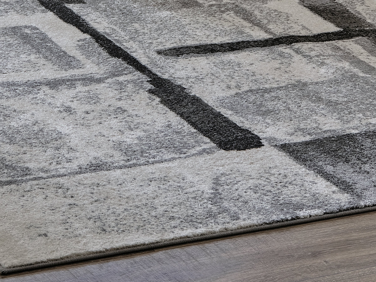 Bradenton Furniture Outlet - Ashley Furniture - Brycebourne Rug - 5'3" x 7'7" Rug / Black/Cream/Gray - R404982