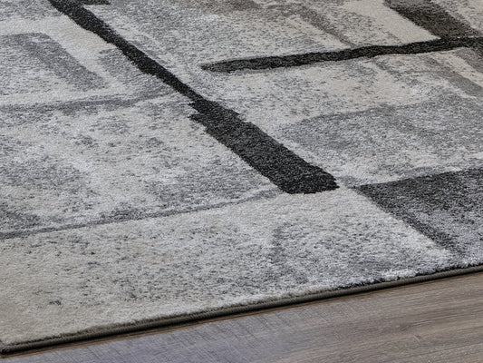 Bradenton Furniture Outlet - Ashley Furniture - Brycebourne Rug - 5'3" x 7'7" Rug / Black/Cream/Gray - R404982