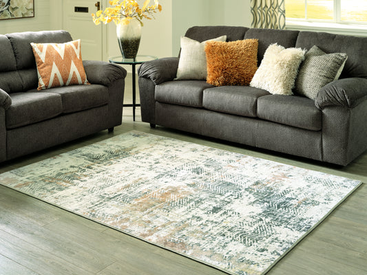 Bradenton Furniture Outlet - Ashley Furniture - Redlings Rug - 7'5" x 9'6" Rug / Multi - R405451