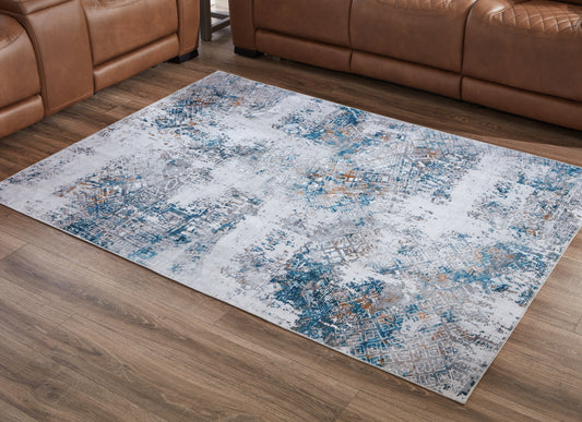 Bradenton Furniture Outlet - Ashley Furniture - Garyard Rug - 5' x 7' Washable Rug / Multi - R405772