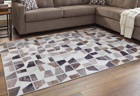 Bradenton Furniture Outlet - Ashley Furniture - Jettner Rug - 5' x 7' Rug / Multi - R405782