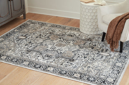 Bradenton Furniture Outlet - Ashley Furniture - Gregmoore Rug - 5'2" x 6'10" Washable Rug / Multi - R405822