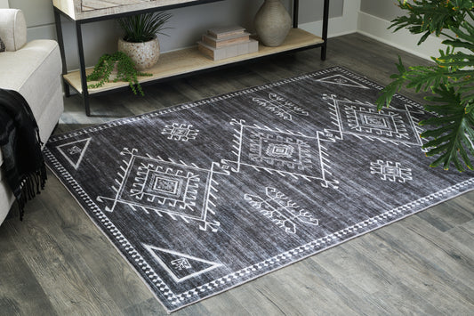 Bradenton Furniture Outlet - Ashley Furniture - Arloman Rug - 5' x 7' Washable Rug / Black/Cream/Gray - R405932