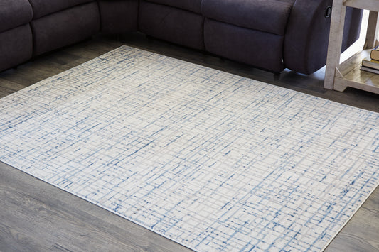 Bradenton Furniture Outlet - Ashley Furniture - Beckfille Rug - 5' x 7' Rug / Blue/Gray/Cream - R405962