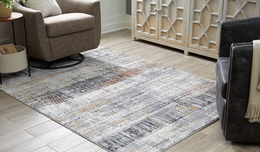 Bradenton Furniture Outlet - Ashley Furniture - Rhettner Rug - 5'3" x 7'3" Rug / Multi - R406072