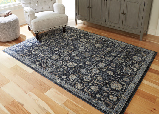 Bradenton Furniture Outlet - Ashley Furniture - Hilcott Rug - 5'3" x 7'3" Rug / Blue/Cream/Brown - R406112