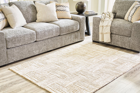 Bradenton Furniture Outlet - Ashley Furniture - Adanmund Rug - 5' x 7' Rug / Beige/Caramel - R406412