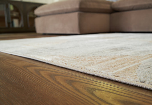 Bradenton Furniture Outlet - Ashley Furniture - Truward Rug - 8' x 10' Rug / Linen/Gray/Caramel - R406471