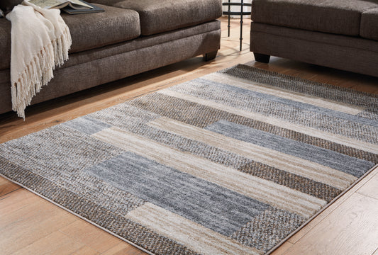 Bradenton Furniture Outlet - Ashley Furniture - Sethburn Rug - 5' x 7' Rug / Cream/Brown/Gray - R406592