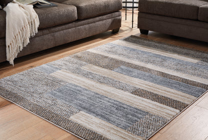 Bradenton Furniture Outlet - Ashley Furniture - Sethburn Rug - 5' x 7' Rug / Cream/Brown/Gray - R406592