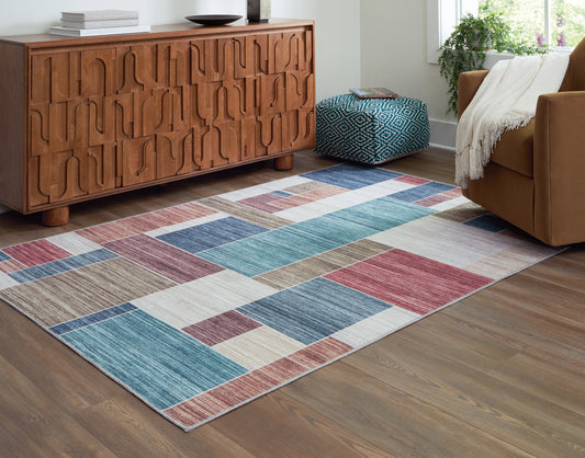 Bradenton Furniture Outlet - Ashley Furniture - Numore Rug - 8' x 9'11" Washable Rug / Multi - R406661