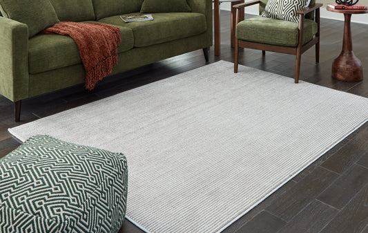 Bradenton Furniture Outlet - Ashley Furniture - Eduring Rug - 5' x 7' Rug / Ivory/Taupe - R406692