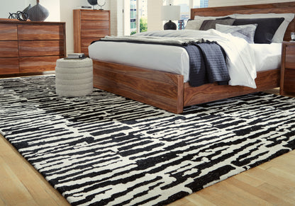 Bradenton Furniture Outlet - Ashley Furniture - Bramshaw Rug - 10' x 14' Rug / Black/Ivory - R406760