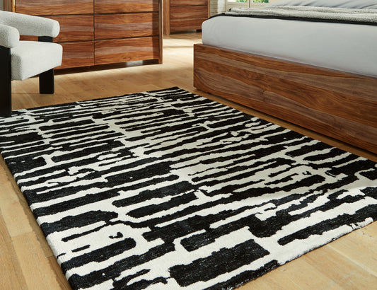 Bradenton Furniture Outlet - Ashley Furniture - Bramshaw Rug - 10' x 14' Rug / Black/Ivory - R406760