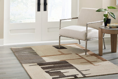 Bradenton Furniture Outlet - Ashley Furniture - Kencher Rug - 5' x 7' Rug / Beige/Brown - R406822