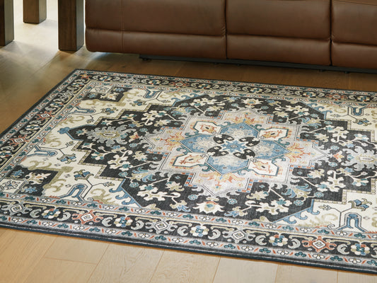 Bradenton Furniture Outlet - Ashley Furniture - Leningston Rug - 8' x 10' Washable Rug / Black/Cream/Blue - R407061