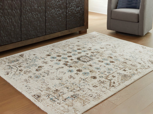 Bradenton Furniture Outlet - Ashley Furniture - Jossler Rug - 5' x 7' Rug / Ivory/Brown/Teal - R407072