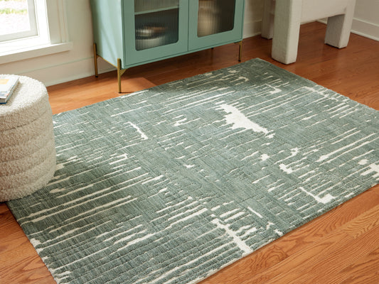 Bradenton Furniture Outlet - Ashley Furniture - Cayworth Rug - 8' x 10' Rug / Teal/White - R407091