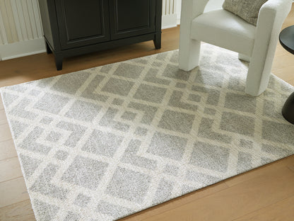 Bradenton Furniture Outlet - Ashley Furniture - Unawick Rug - Large Rug / Gray/Ivory - R407331