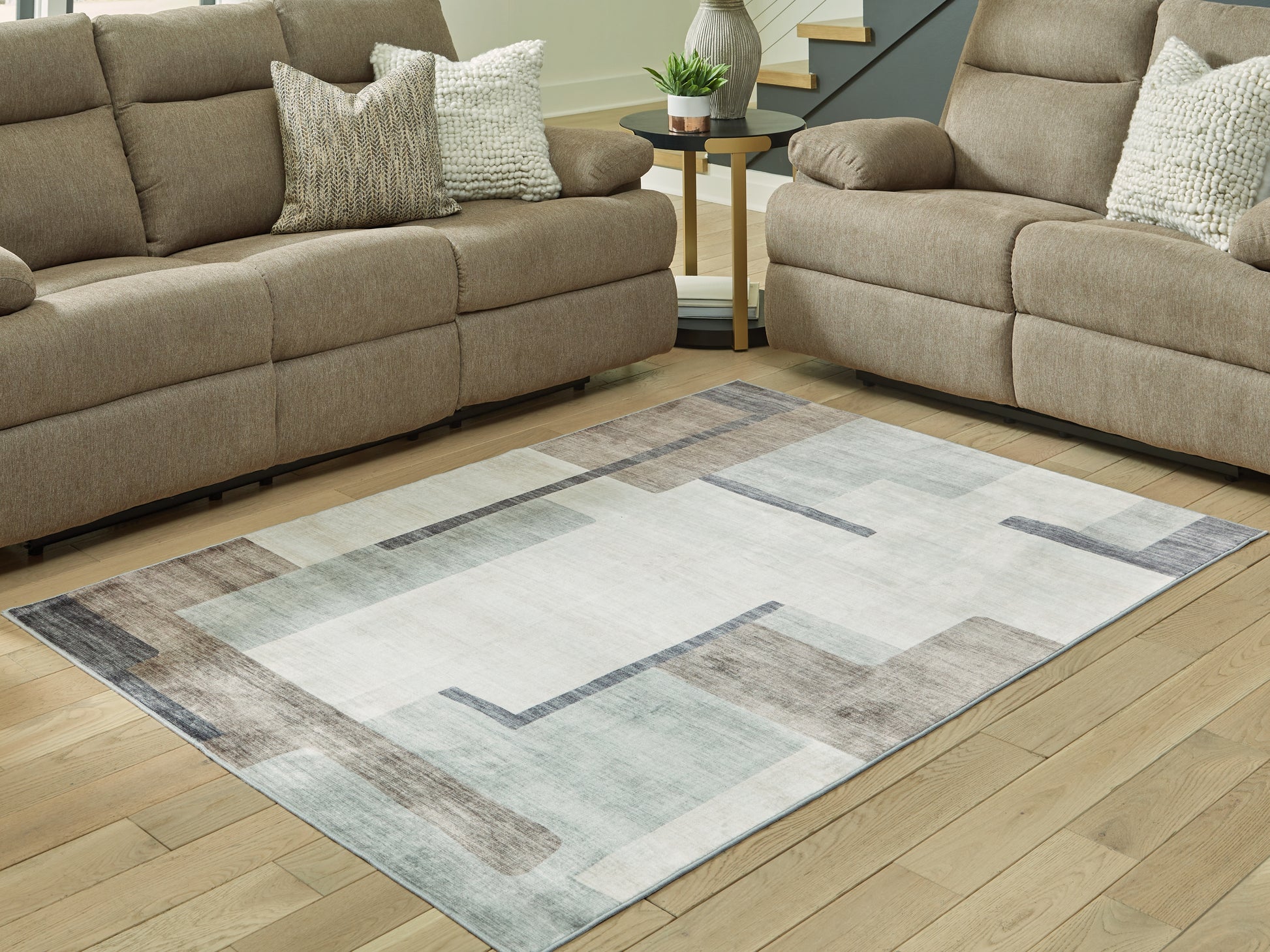 Bradenton Furniture Outlet - Ashley Furniture - Larkport Rug - Washable 8' x 10' Area Rug / Cream/Brown/Gray - R407411