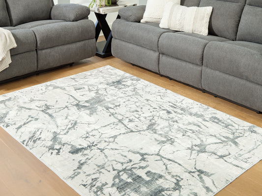 Bradenton Furniture Outlet - Ashley Furniture - Tobinbury Rug - Washable 8' x 10' Area Rug / Gray - R407421