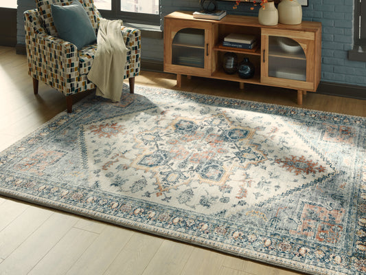 Bradenton Furniture Outlet - Ashley Furniture - Wallney Rug - 5' x 7' Area Rug / Multi - R407492