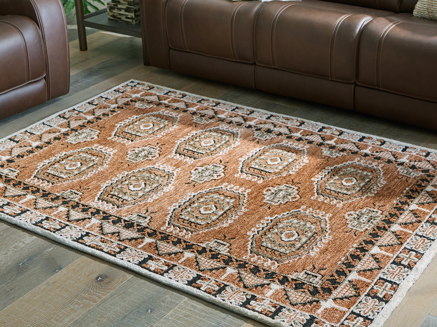 Bradenton Furniture Outlet - Ashley Furniture - Qaabiz Rug - 5' x 7' Area Rug / Sienna/Ivory/Black - R407522
