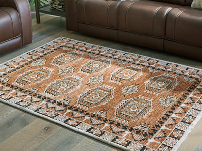 Bradenton Furniture Outlet - Ashley Furniture - Qaabiz Rug - 5' x 7' Area Rug / Sienna/Ivory/Black - R407522