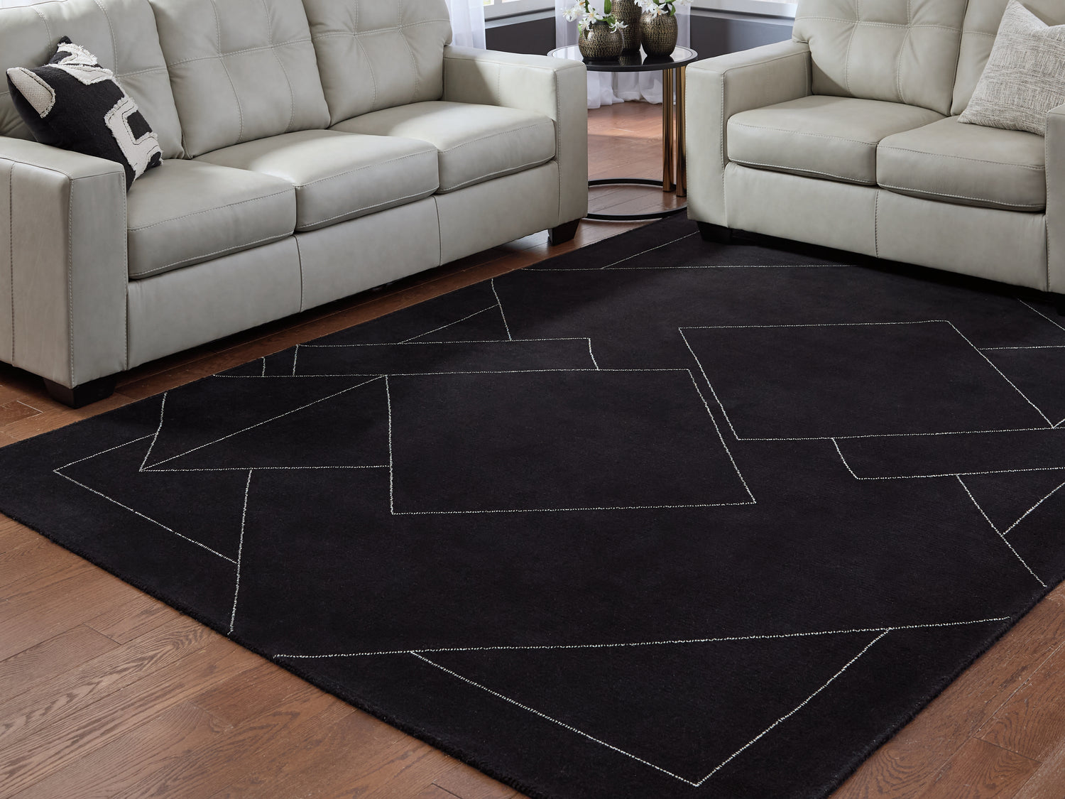 Bradenton Furniture Outlet - Ashley Furniture - Marav Rug - 5' x 7' Area Rug / Black/White - R407532