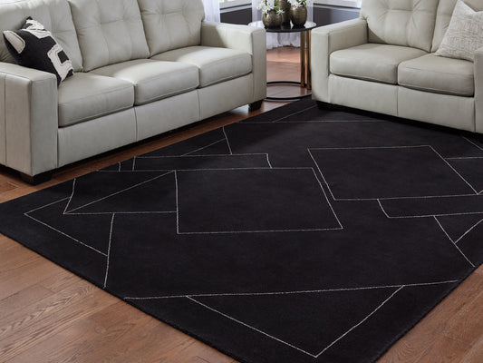Bradenton Furniture Outlet - Ashley Furniture - Marav Rug - 5' x 7' Area Rug / Black/White - R407532