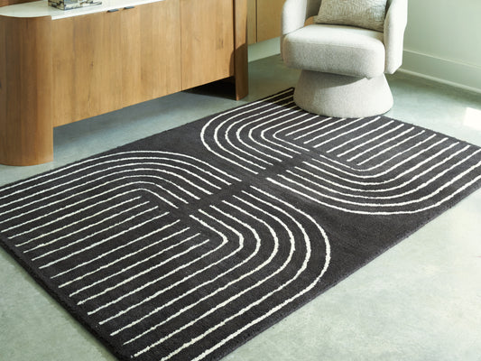 Bradenton Furniture Outlet - Ashley Furniture - Eldonmore Rug - 5' x 7' Area Rug / Black/Ivory - R407572