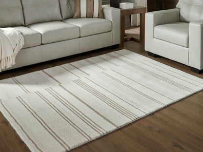 Bradenton Furniture Outlet - Ashley Furniture - Gadence Rug - 5' x 7' Area Rug / Ivory/Tan - R407642