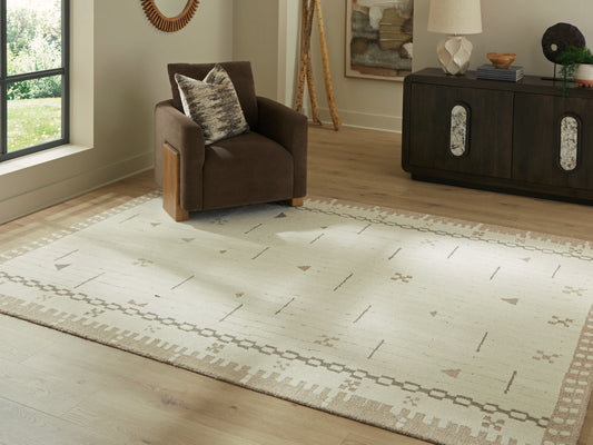 Bradenton Furniture Outlet - Ashley Furniture - Dot Rug - 7'8" x 10' Area Rug / Cream/Brown/Taupe - R407651