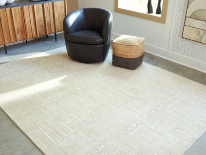 Bradenton Furniture Outlet - Ashley Furniture - Wolbert Rug - 7'8" x 10' Area Rug / Tan/Ivory - R407661