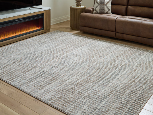 Bradenton Furniture Outlet - Ashley Furniture - Fuadwick Rug - 7'10" x 10' Area Rug / Multi - R407691