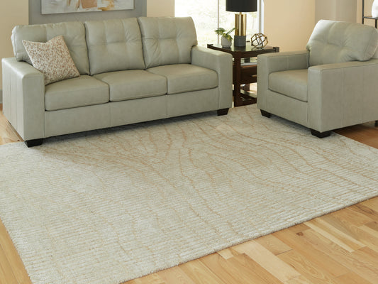 Bradenton Furniture Outlet - Ashley Furniture - Jaseena Rug - 5' x 7' Area Rug / Beige/Tan - R407722
