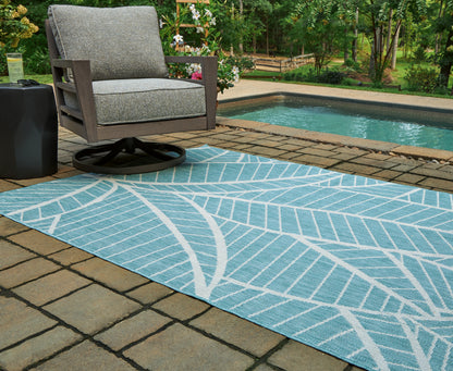 Bradenton Furniture Outlet - Ashley Furniture - Hulsia Rug - 5' x 7' Rug / Ivory/Aqua - R900122
