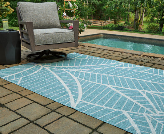 Bradenton Furniture Outlet - Ashley Furniture - Hulsia Rug - 5' x 7' Rug / Ivory/Aqua - R900122