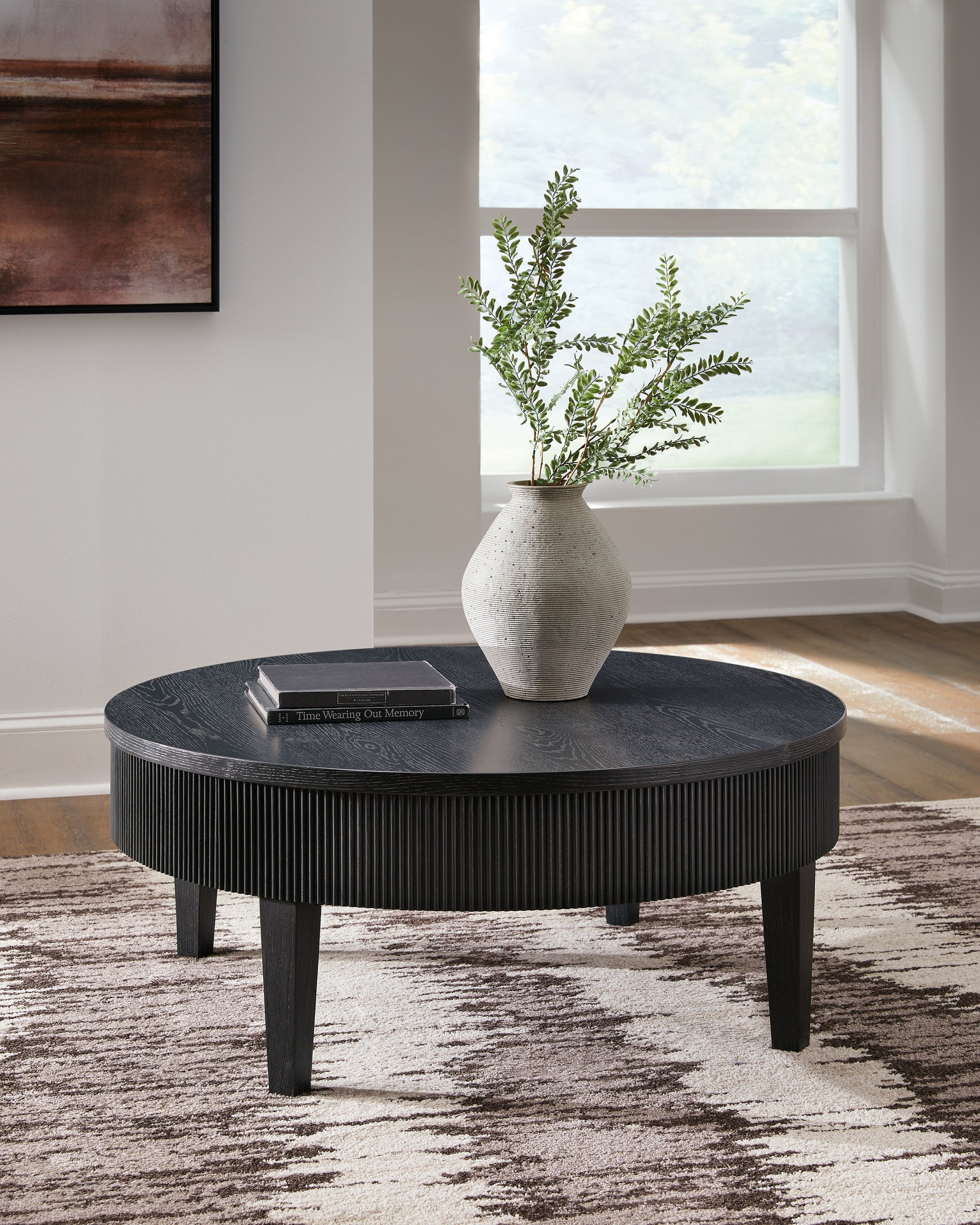 Bradenton Furniture Outlet - Ashley Furniture - Marstream Coffee Table - Round Cocktail Table / Black - T551-8